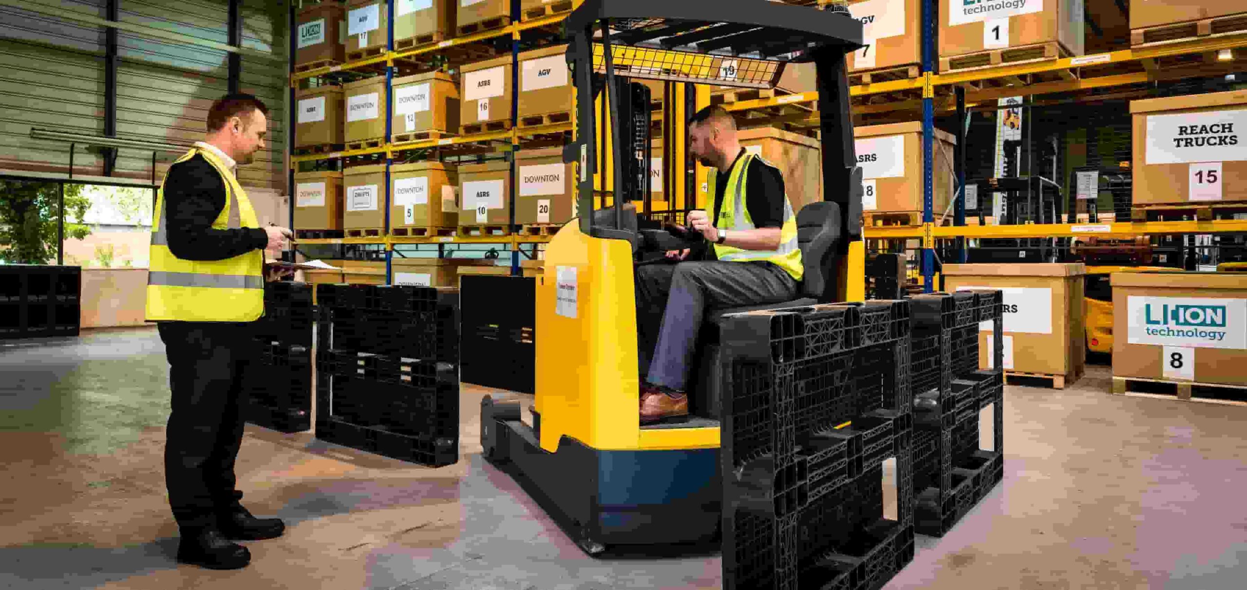 FootShield Pro rear-mounted collision sensor installed on an electric pallet truck